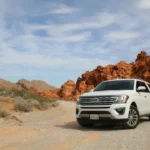 parked white Ford Explorer SUV